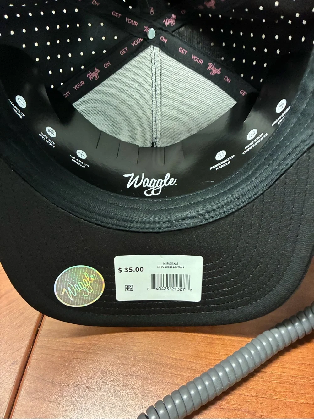 Black Snapback Hat with Red Embroidered Front Emblem